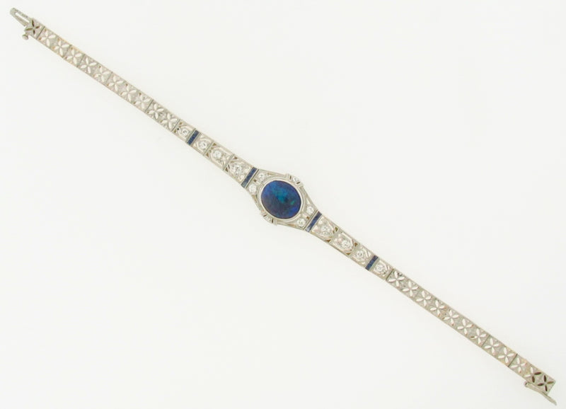 PLATINUM AND GOLD, BLACK OPAL AND DIAMOND BRACELET | 18 Karat Appraisers | Beverly Hills, CA | Fine Jewelry