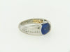 PLATINUM AND 18K YELLOW GOLD SAPPHIRE AND DIAMOND RING