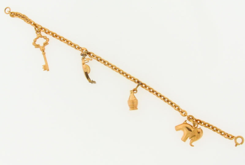 18K YELLOW GOLD CHARM BRACELET | 18 Karat Appraisers | Beverly Hills, CA | Fine Jewelry