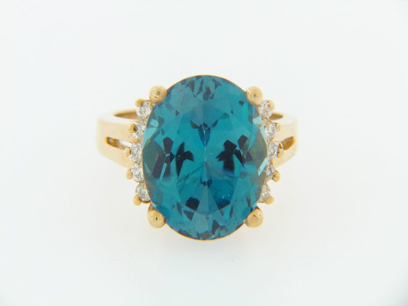 14K-YG BLUE TOPAZ AND DIAMOND RING