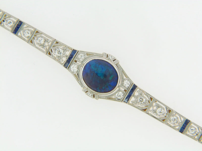 PLATINUM AND GOLD, BLACK OPAL AND DIAMOND BRACELET | 18 Karat Appraisers | Beverly Hills, CA | Fine Jewelry